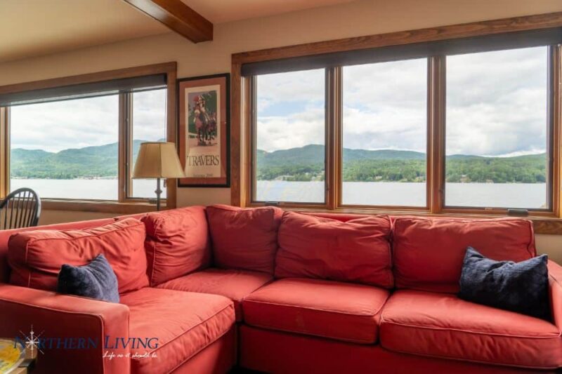 red sectional couch with views of Lake George