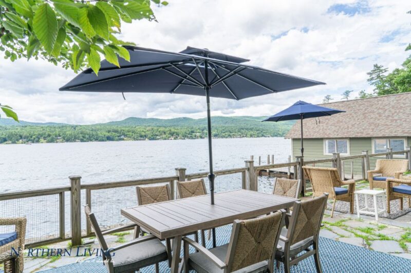Views of Lake George and the surrounding mountains from the patio at French Mountain Cove vacation home rental on Lake George