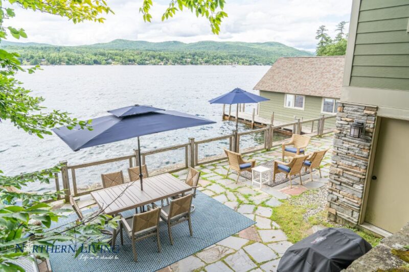 patio overlooking the boathouse and Lake George