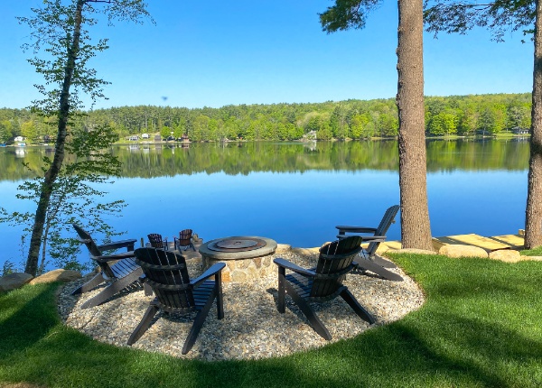 Shoreline Chateau firepit by the water