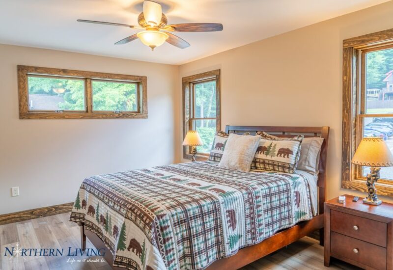 bed with ceiling fan