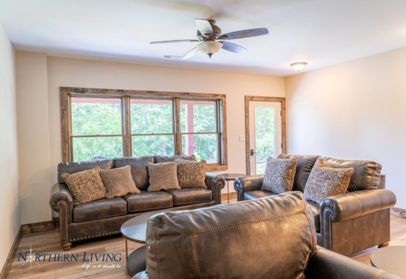 sitting area inside island overlook vacation home rental on lake george