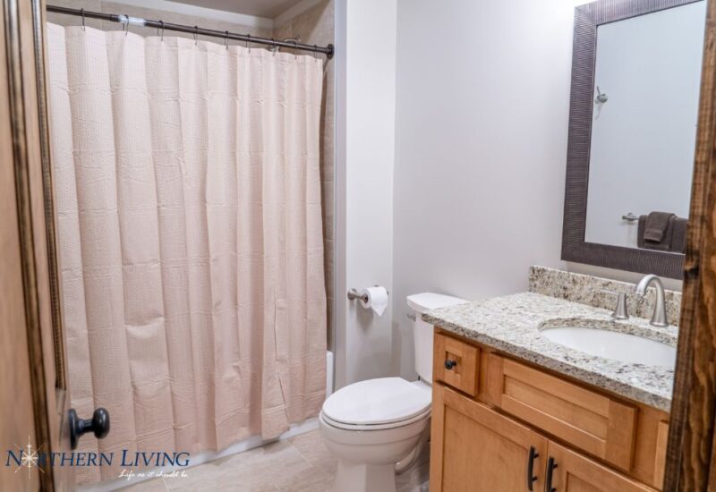 full bath with bathtub inside Island Overlook vacation home rental in Lake George
