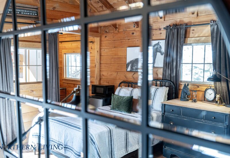 reflection in the mirror inside The Saratogian cabin rental in Lake George