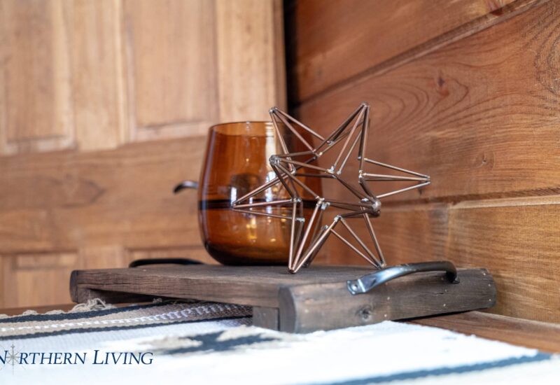 star-shaped metal art on a dresser