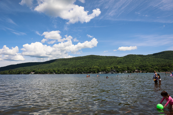 people swimming in Lake George