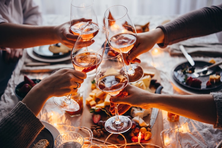 glasses of rose wine at a dinner party